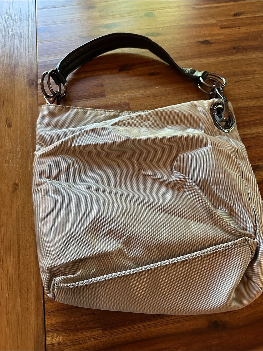 Cream Shoulder Bag with Dark Handle and Silver Hardware